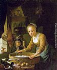 Gerrit Dou Canvas Paintings - Girl Chopping Onions